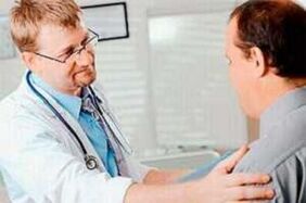 A man with prostatitis at a doctor's meeting